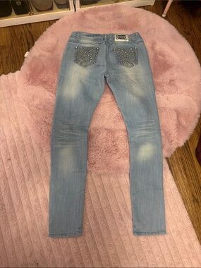 Light Blue Skinny Jeans with Embellished Back Pockets - Women